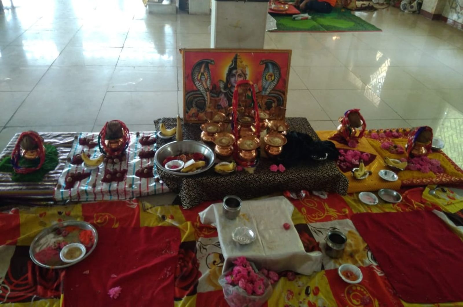 Devotees seated at a sacred puja in Ujjain